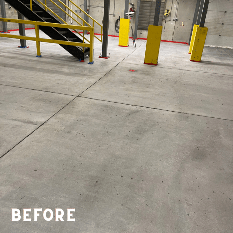 Image of a shiny, gray epoxy floor with a smooth surface and a subtle pattern. The flooring is highly durable and easy to maintain, making it ideal for high-traffic areas.